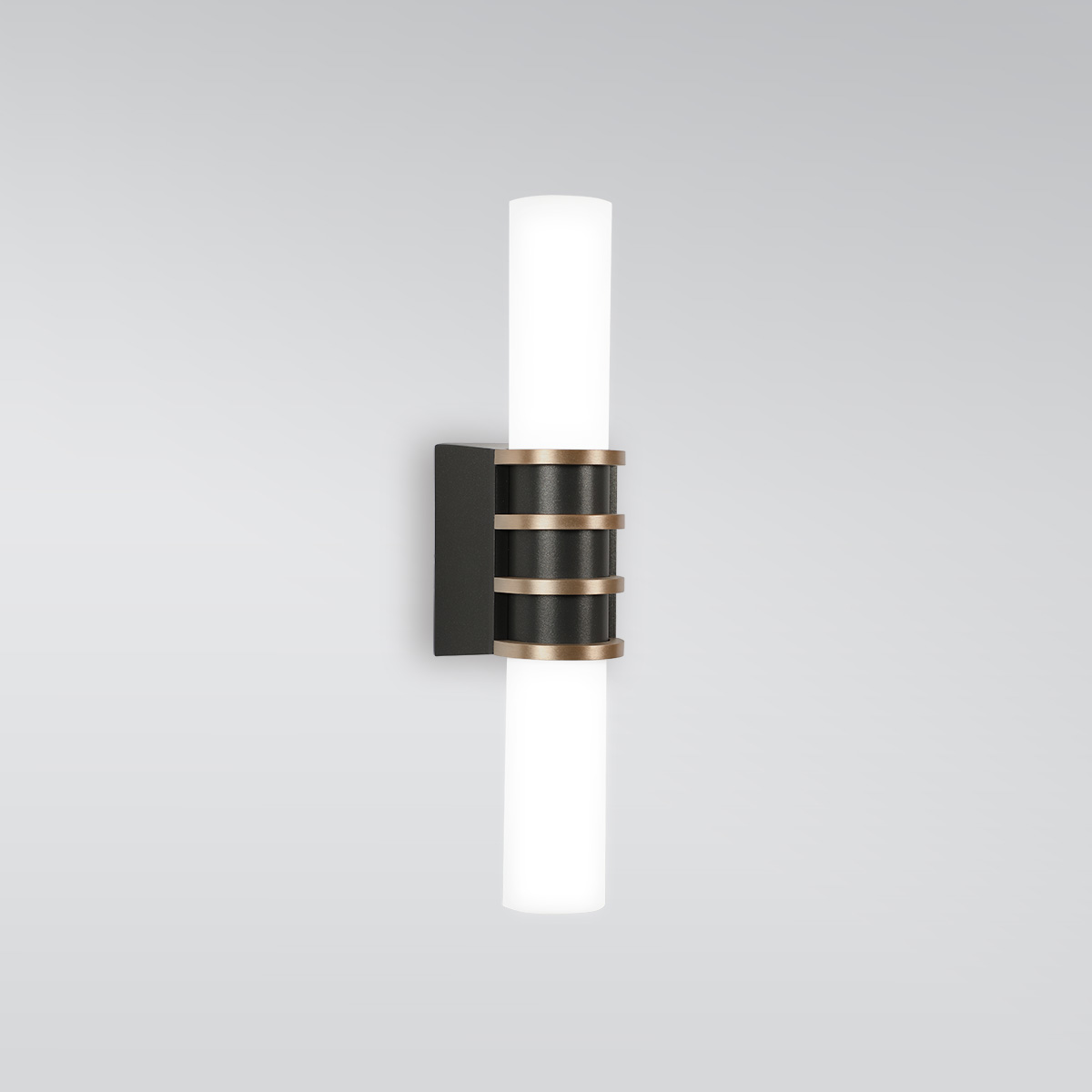 A small cylindrical indoor sconce with a center trim