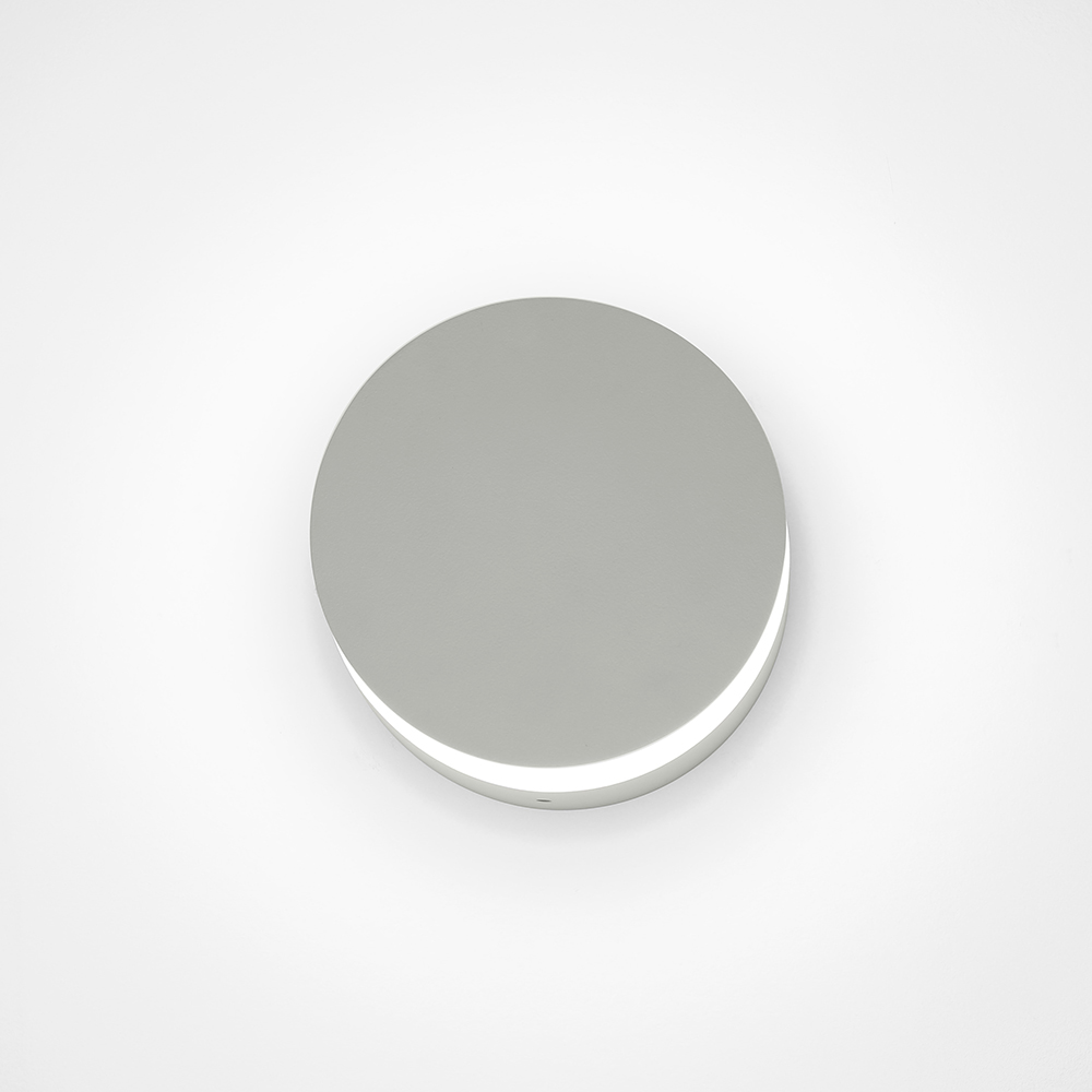 Bliss Round, a round healthcare sconce provides a beautiful circle of illumination from its shallow cylindrical form