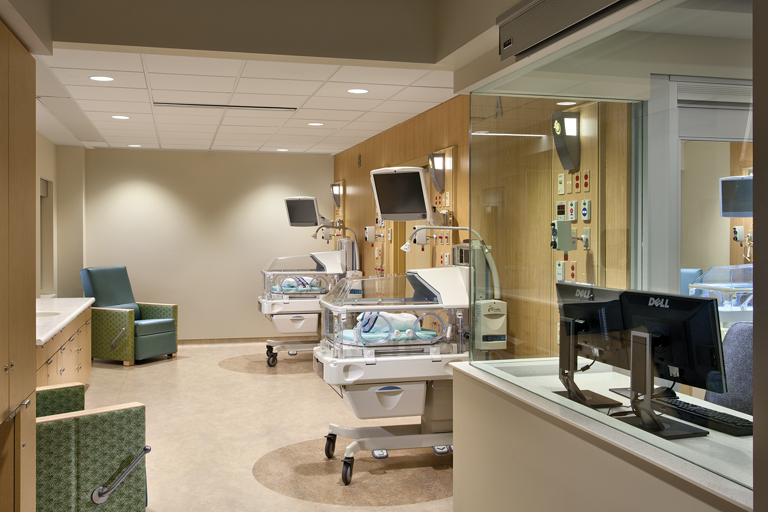 Cypress custom light fixtures in a healthcare facility, above a clean, modern NICU unit.