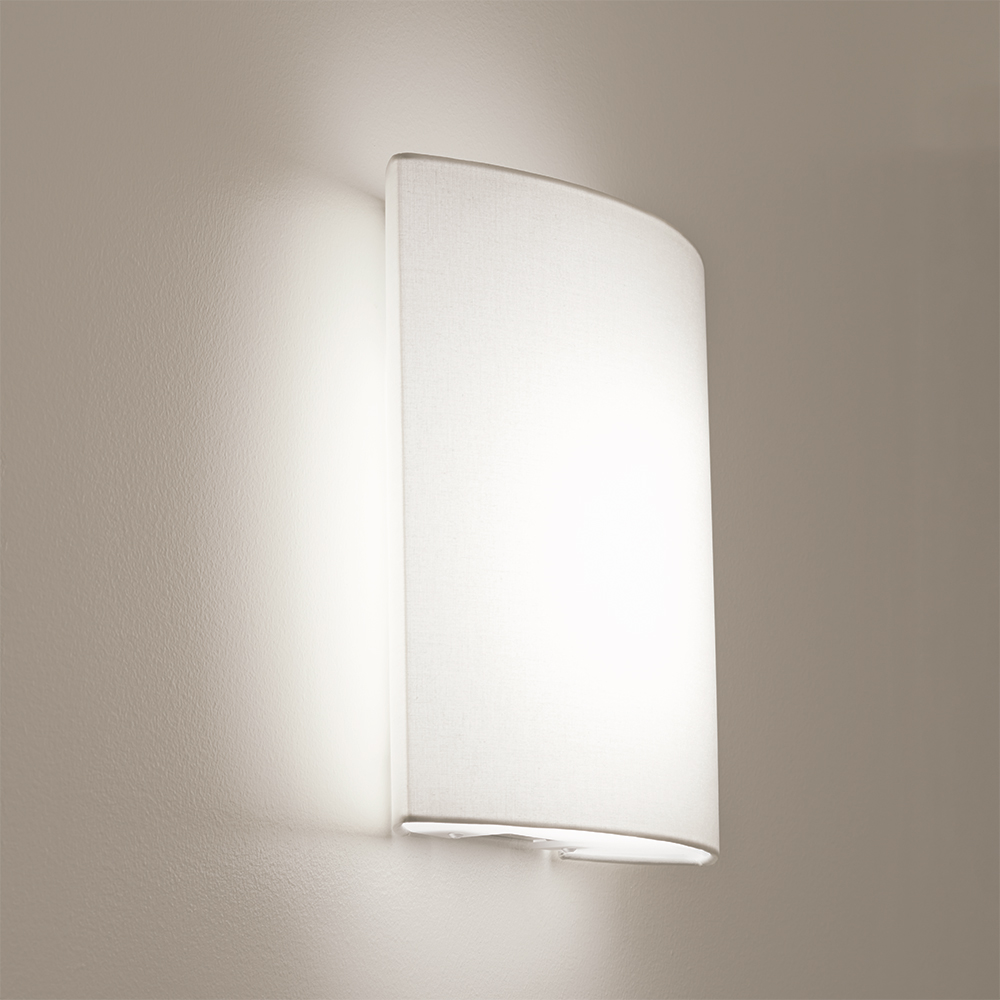 Healthcare wall sconce with curved front 