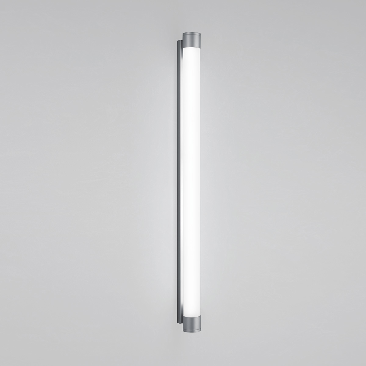 A luminous wall sconce in a thin tube shape with metal caps on each end