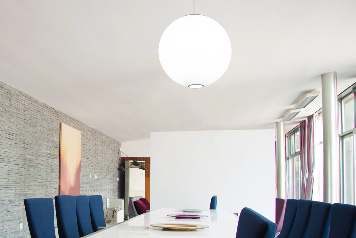 Globe pendant over office desk with downlight for additional illumination
