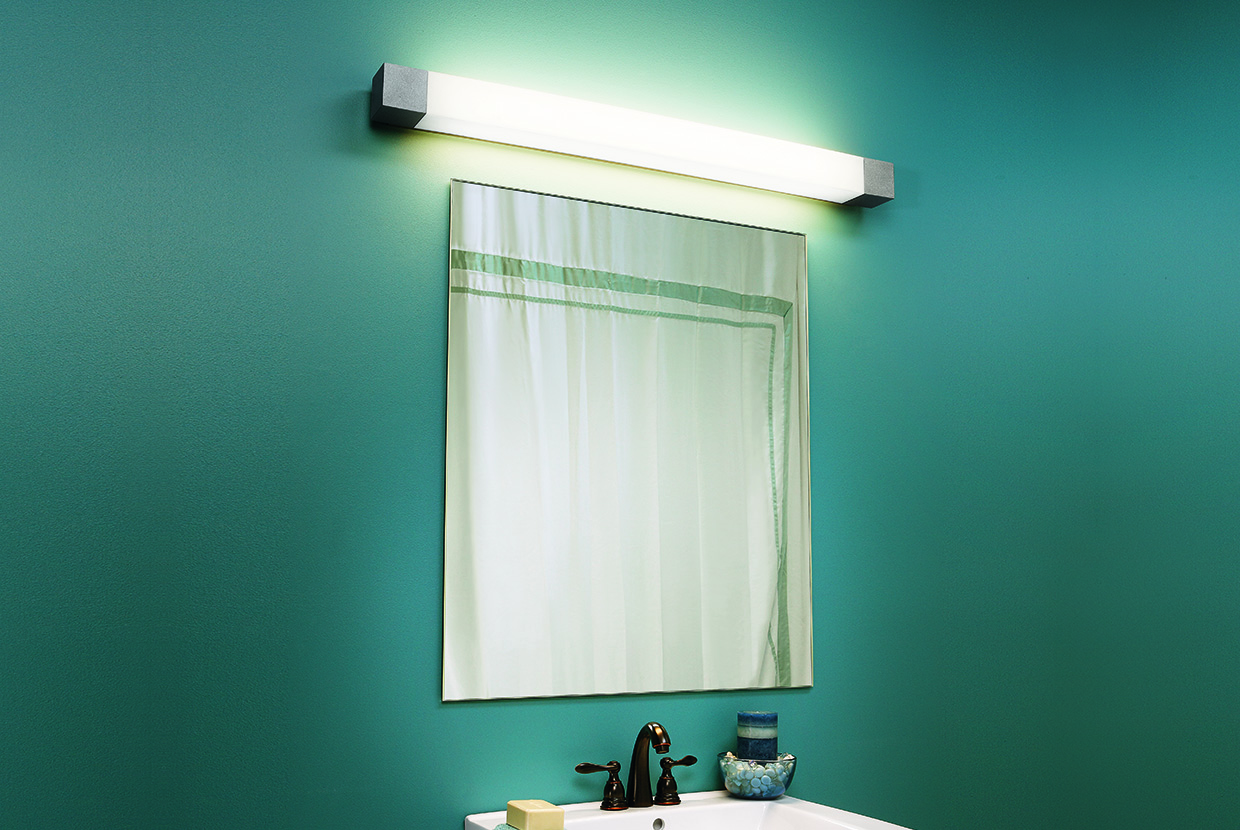 A luminous rectangular wall sconce with solid end caps 