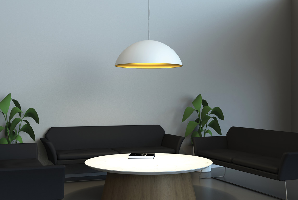 LED dome pendant in white and gold hung in waiting room above coffee table